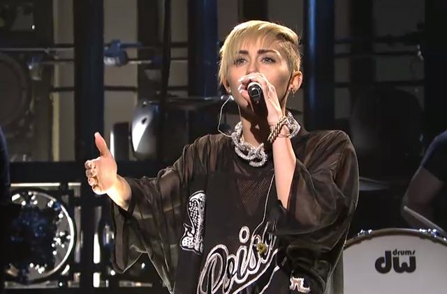Miley Cyrus performs "Wrecking Ball" and "We Can't Stop."